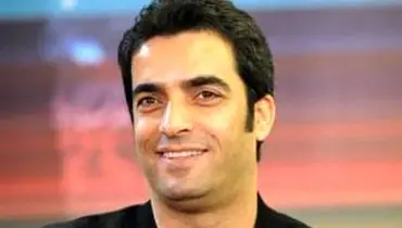 پرچم ایران در دست منوچهر هادی/عکس