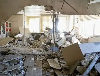 اثرات  حمله هوایی  دشمنان متجاوز به ساختمان پلیس مبارزه با مواد مخدر در تهران + عکس
