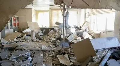 اثرات  حمله هوایی  دشمنان متجاوز به ساختمان پلیس مبارزه با مواد مخدر در تهران + عکس
