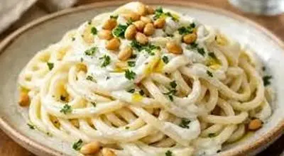 طرز تهیه اسپاگتی با سس ماست و دانه کاج
