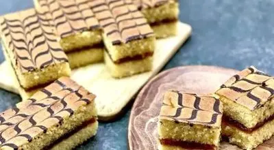 طرز تهیه تیتاپ مغزدار خانگی: بازآفرینی خاطره‌انگیزترین کیک دوران مدرسه