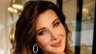 عکس زن و شوهری نانسی روی یک کشتی تفریحی