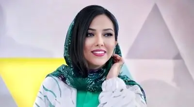 لیلا اوتادی کنار جواد افشار در پشت‌صحنه «گاندو»