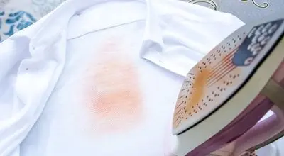 ترفندهای کاربردی رفع سوختگی و لکه‌های لباس با اتو
