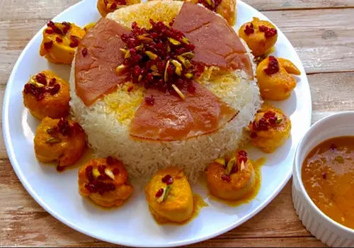 دستور پخت کامل مرغ پرتقالی مجلسی با تهچین و زرشک پلو+ فیلم 