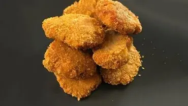 ۶۰ ناگت خوشمزه با تنها ۱ کیلو مرغ؛ دستور پختی ساده و مقرون‌به‌صرفه+ فیلم