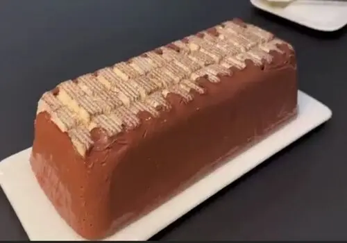 روش پخت لذیذترین کیک خیس با گاناش شکلاتی+ فیلم / طرز تهیه کیک خیس شکلاتی با بافت لطیف