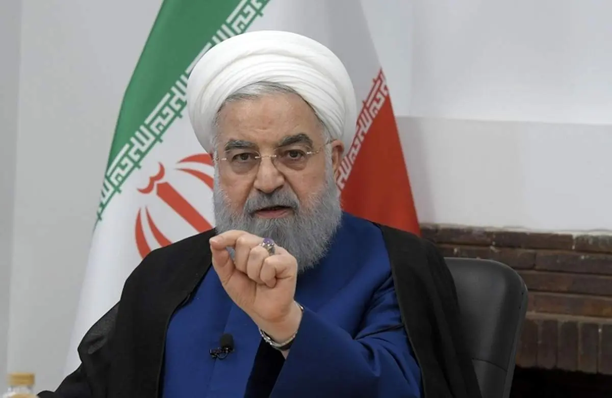 حضور حسن روحانی بر سر مزار والدین خود/عکس