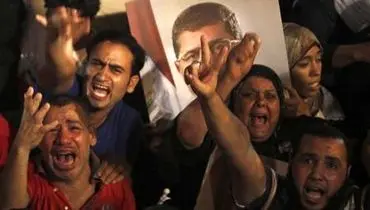 عکس/ واکنش هواداران مرسی به برکناری اش