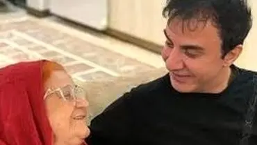 تصویری از عموپورنگ و مادرش در یک مکان مذهبی