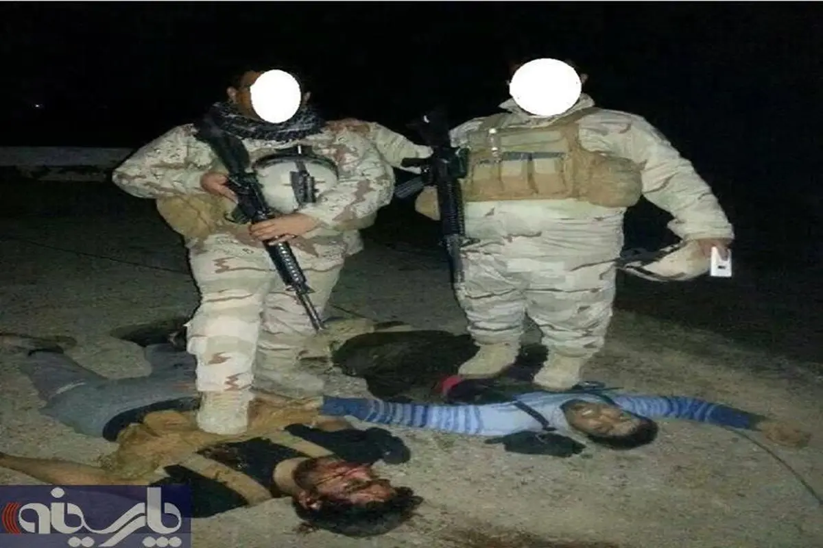 عکس یادگاری ارتش عراق با جنازه های افراد داعش