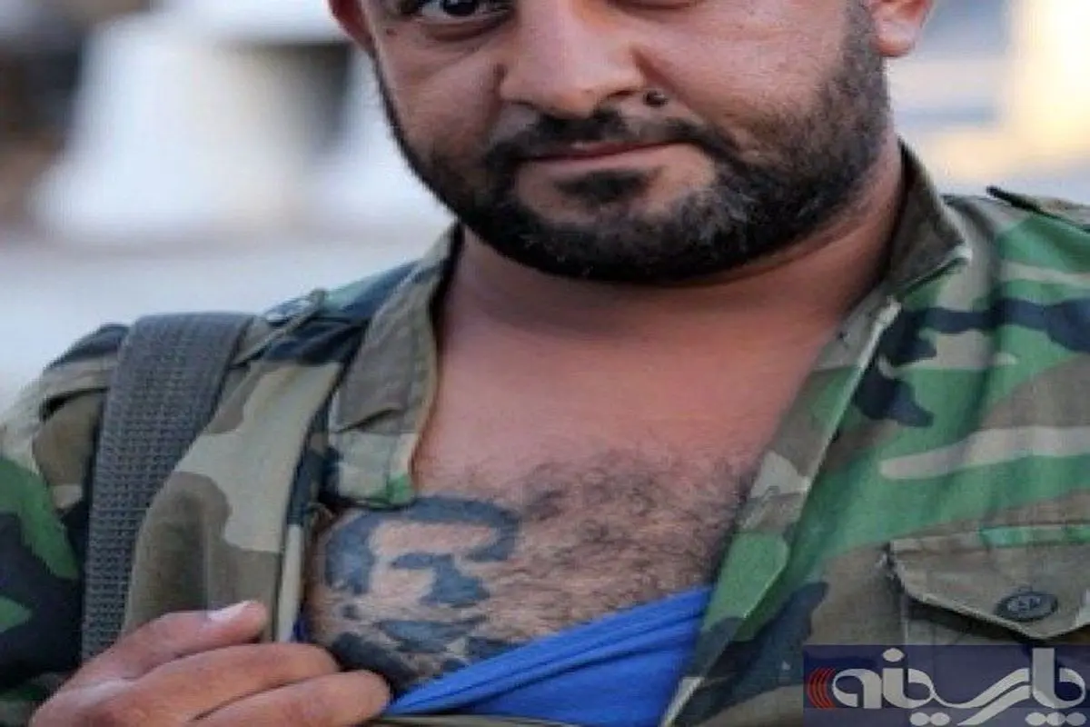 عکس:خالکوبی تصویر حافظ اسد روی بدن یک سرباز ارتش سوریه