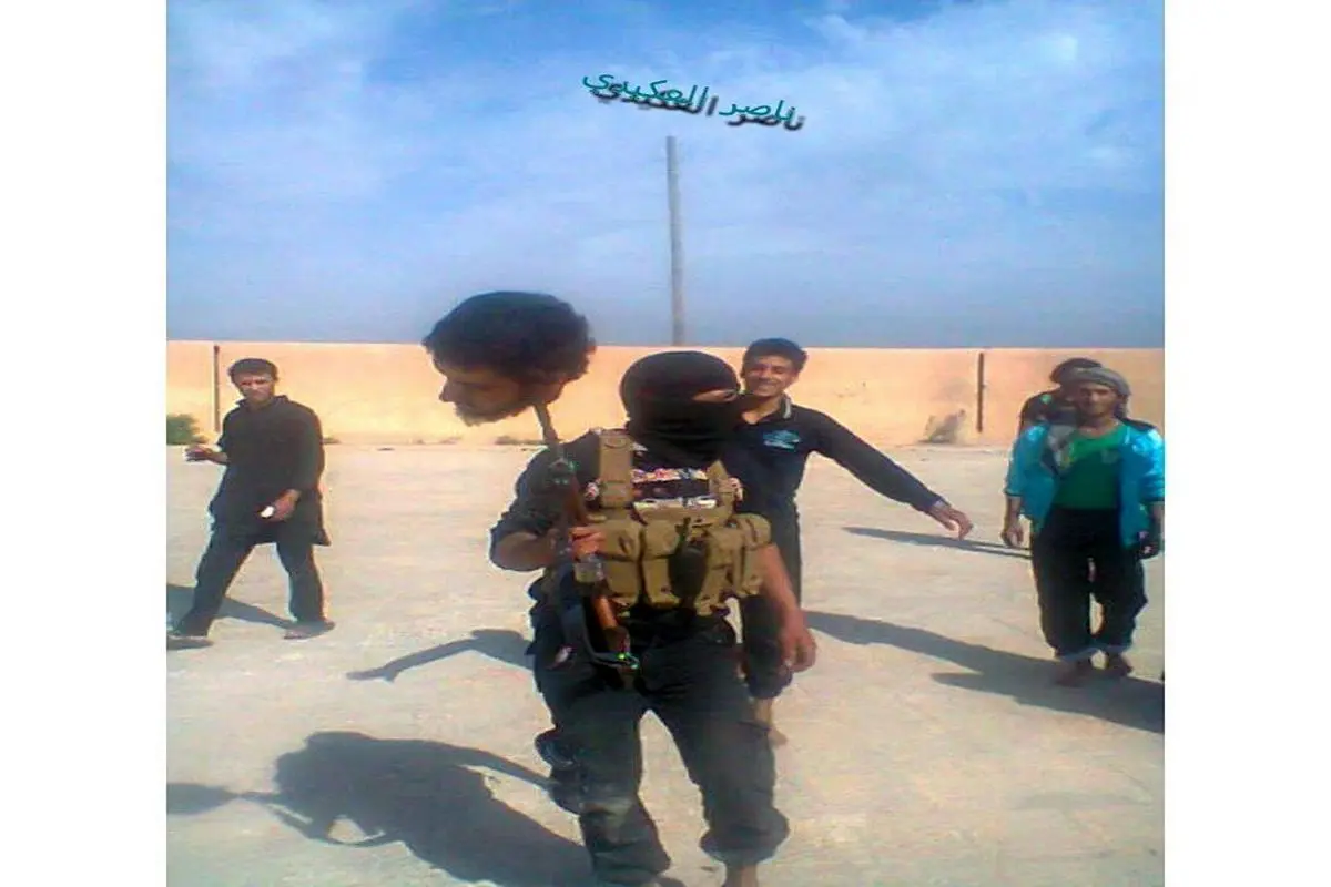 عکس:سربریده روی سرنیزه حاصل درگیری داعش و جبهه النصره/ سوریه