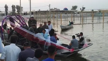 جشن عروسی روی سیلاب کرخه! +عکس