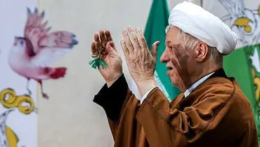عکس: هاشمی رفسنجانی و مرغ پرنده