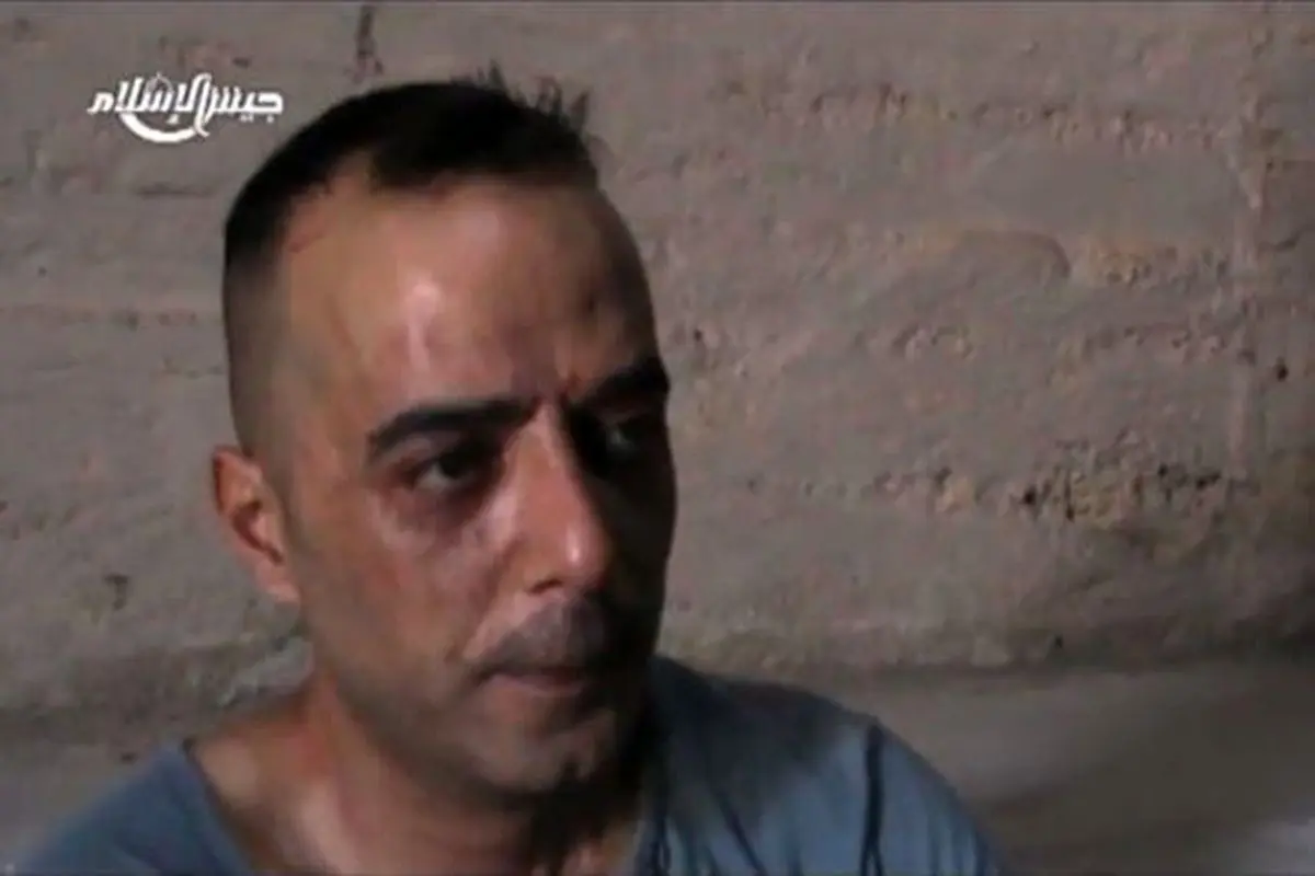 عکس:اسیر شدن و اعدام خلبان ارتش سوریه توسط جیش الاسلام