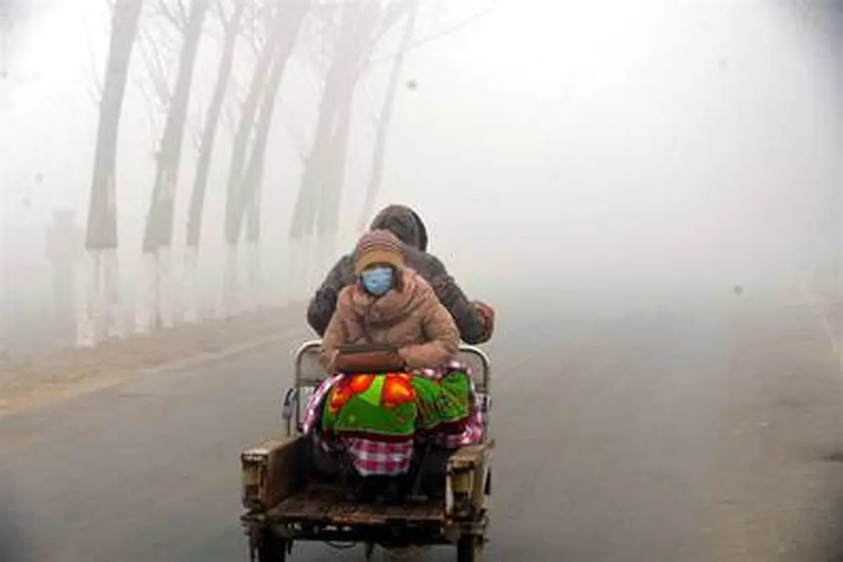 تصاویر وضعیت قرمز هوا و کمبود اکسیژن در چین!