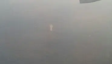 مشاهده دود پلاسکو از هواپیما +عکس