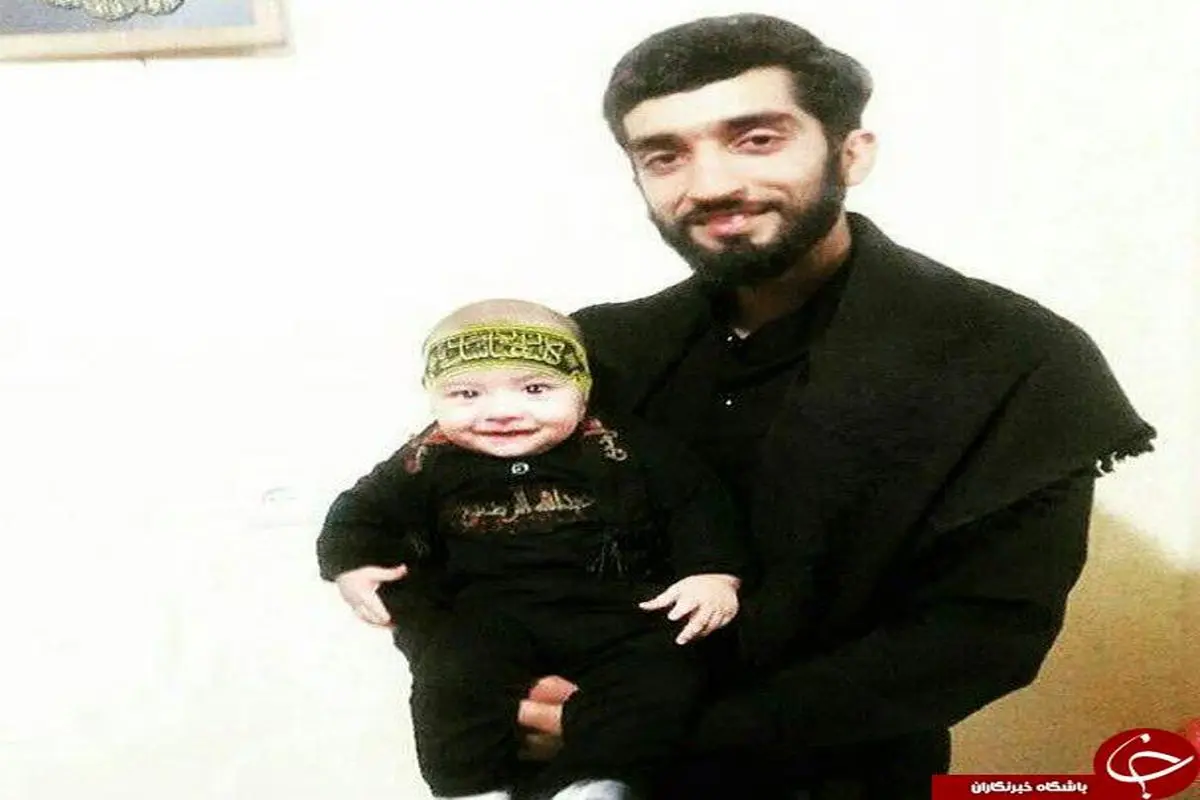 عکسی متفاوت از شهید حججی و فرزندش