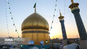 تعویض پرچم حرم حضرت معصومه(س)+عکس