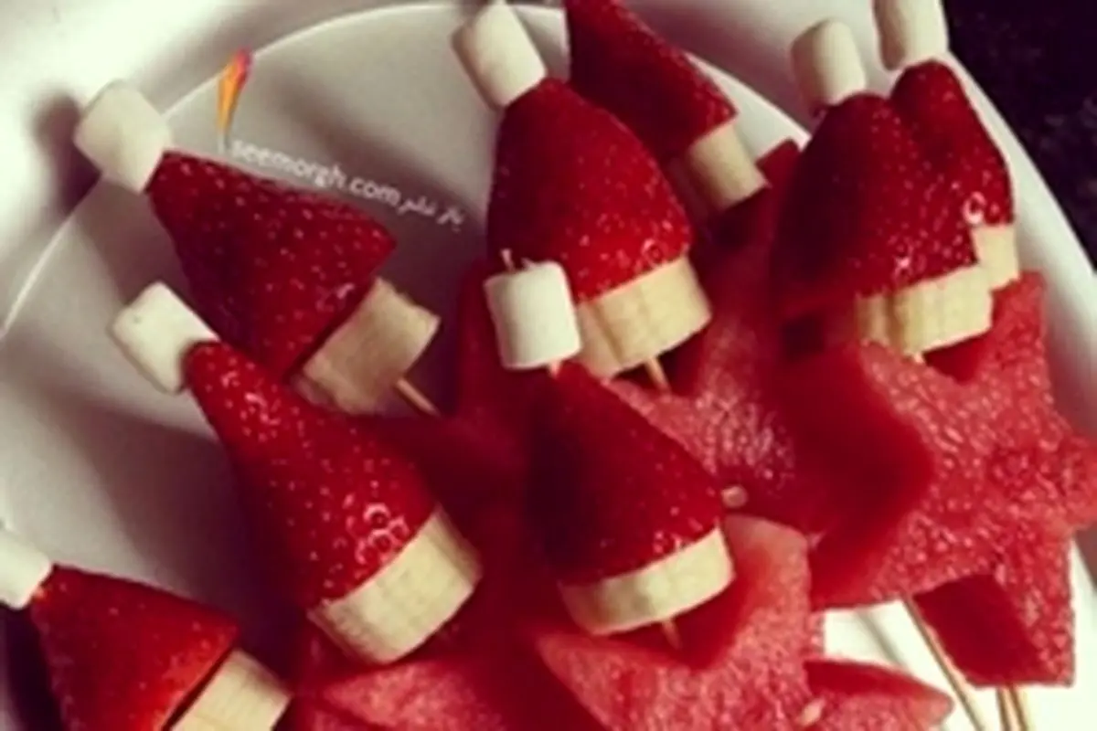 تزیین میوه به شکل بابانوئل برای کریسمس