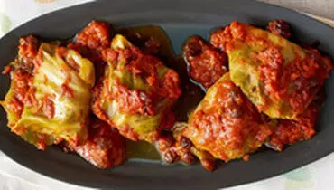 طرز تهیه و پیچیدن دلمه کلم مجلسی