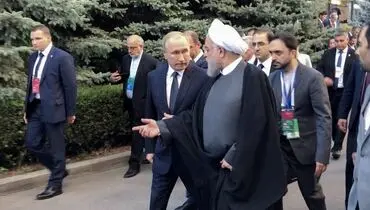 عکسی از قدم زدن روحانی و پوتین در ایروان