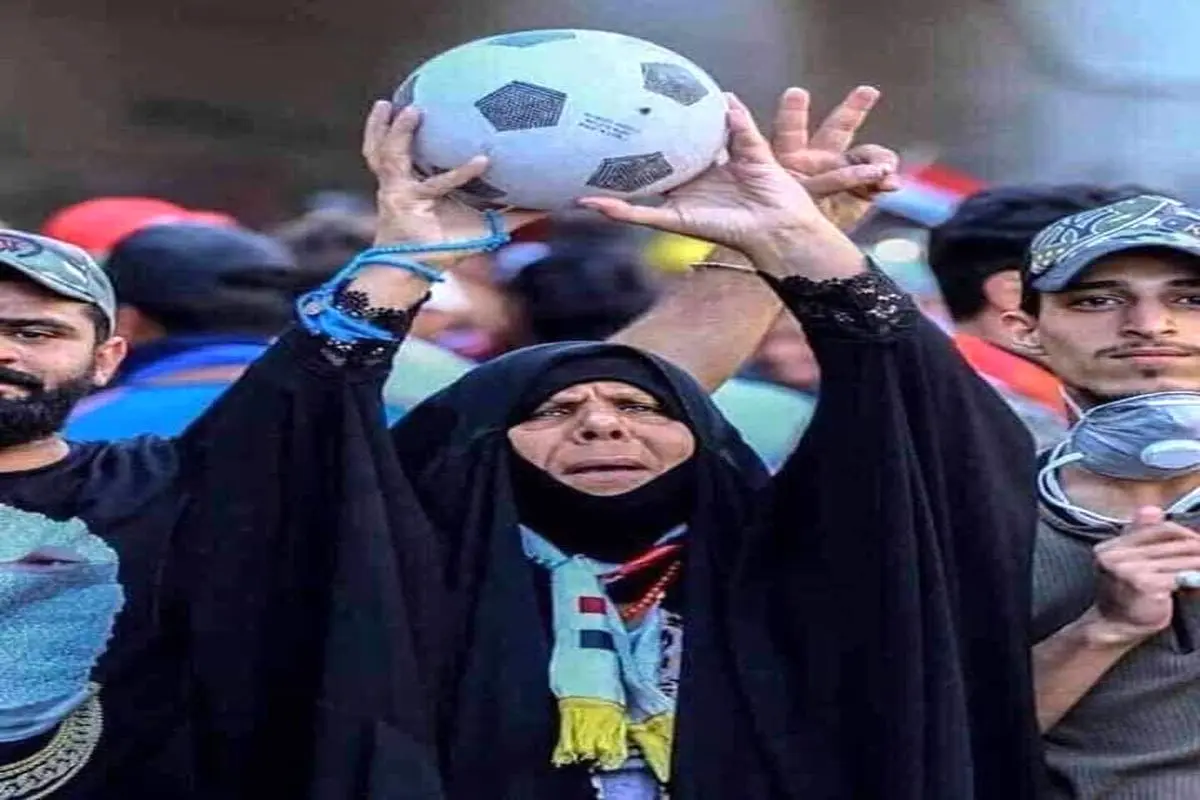 تصویر زن عراقی که با برد عراق مقابل ایران، جهانی شد!