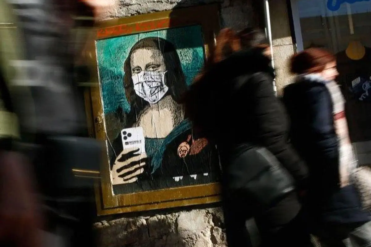 ماسک ضد کرونا روی صورت مونالیزا با آیفون ۱۱ +تصویر