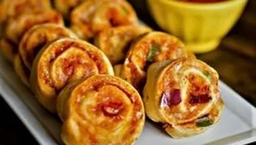 طرز تهیه پیتزا چرخی یک فینگر فود خوشمزه