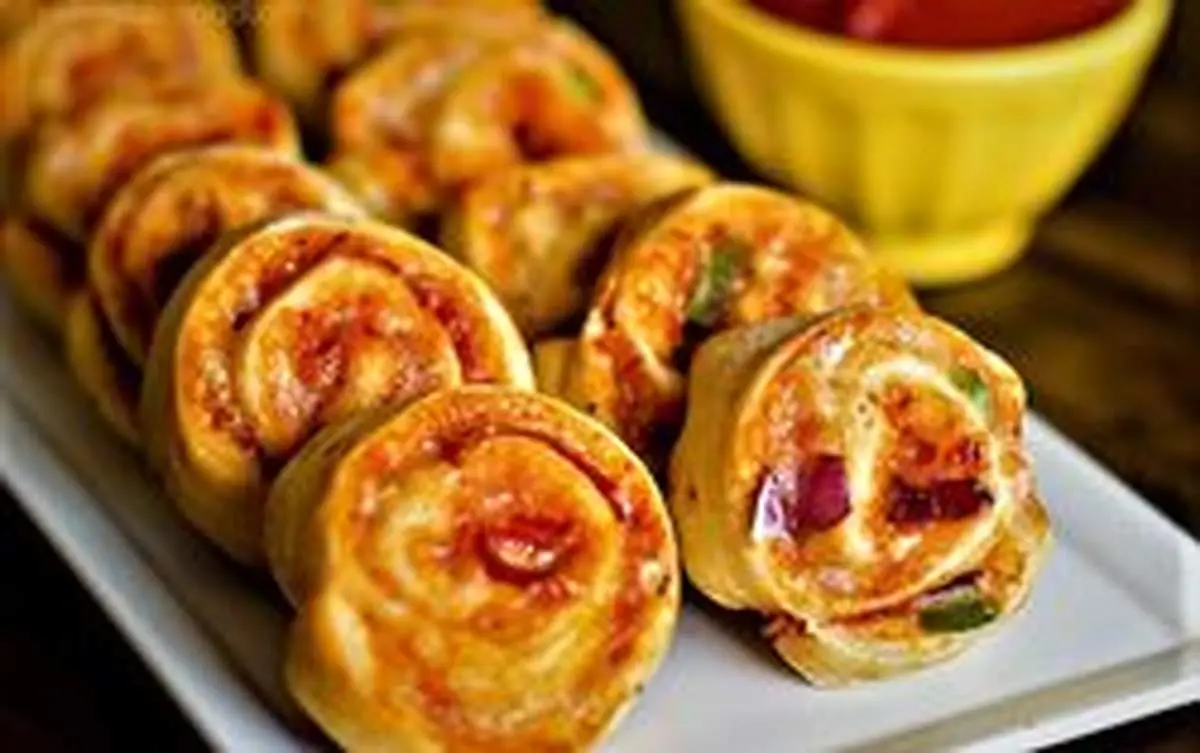 طرز تهیه پیتزا چرخی یک فینگر فود خوشمزه