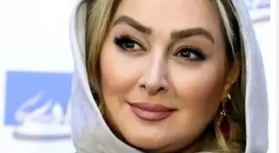 تصویری از الهام حمیدی و حیوان خانگی‌اش در پارک