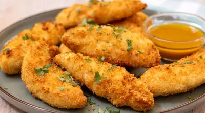 ناگت‌های مرغ با ۴ ماده اولیه؛ طلای شام شب‌های شلوغ