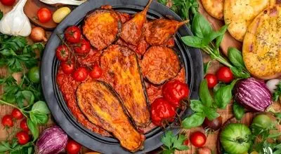 طرز تهیه خوراک گوجه بادمجان ساده با طعمی بینظیر