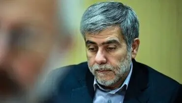 تصویری از شهید فریدون عباسی در کنار رهبر انقلاب

