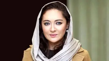 نیکی کریمی در کنار علی دایی روی نیکمت