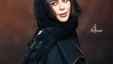 استایل متفاوت الهام اخوان در برج میلاد با پالتوی بلند و موهای فر پرحجم+فیلم