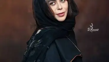 استایل متفاوت الهام اخوان در برج میلاد با پالتوی بلند و موهای فر پرحجم+فیلم