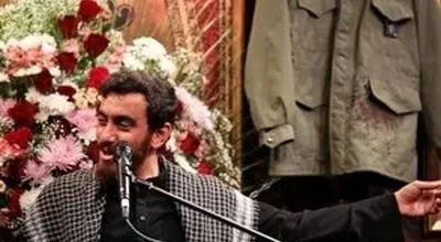لباس خونین شهدای حمله اسرائیل در یک هیات عزاداری/عکس