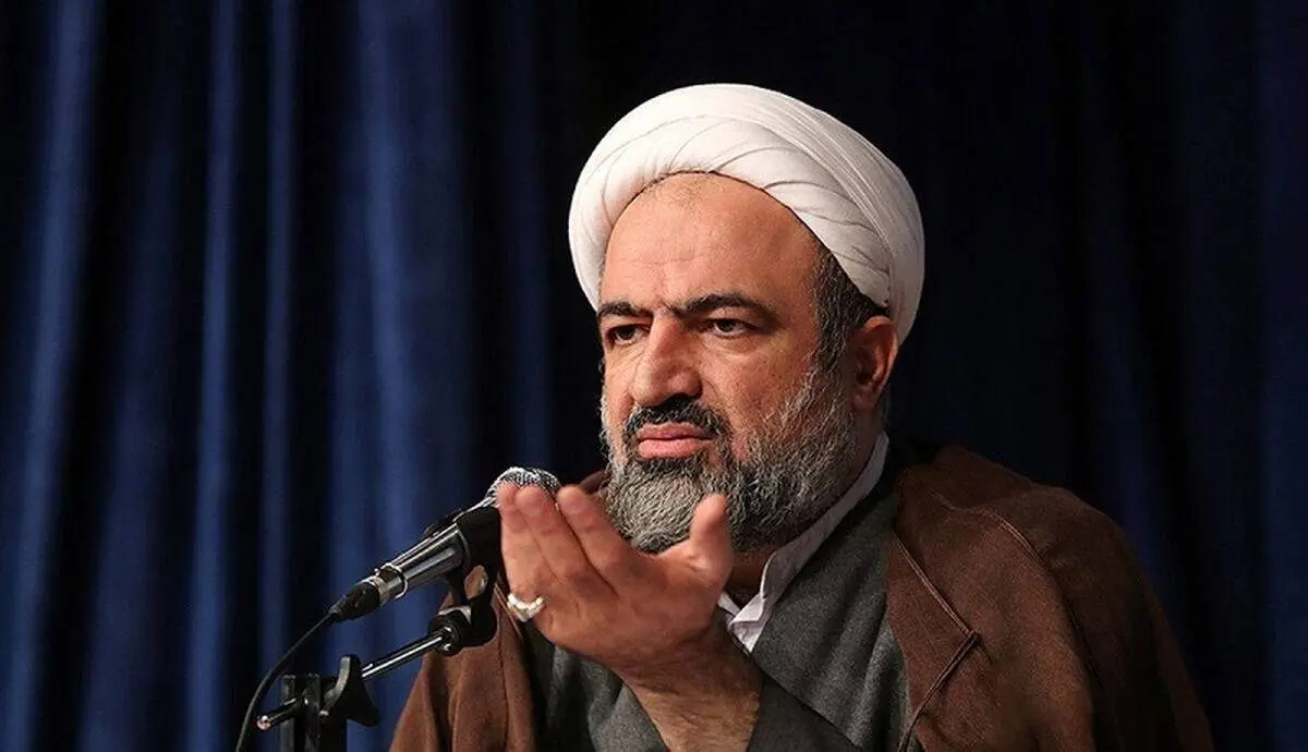 عکس نوجوانی حمید رسایی با سلاح جنگی
