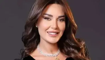 عکسی عاشقانه از زیباترین خواننده زن عرب و همسرش