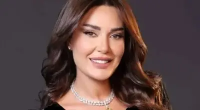 عکسی عاشقانه از زیباترین خواننده زن عرب و همسرش