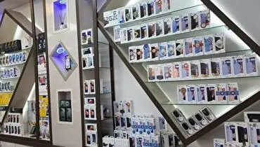 ماجرای دکور مغازه ای با آیفون های مدفون شده در بتن+ فیلم