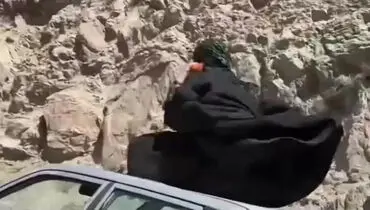 حرکات عجیب زن چادری روی سقف پراید در وسط جاده + فیلم