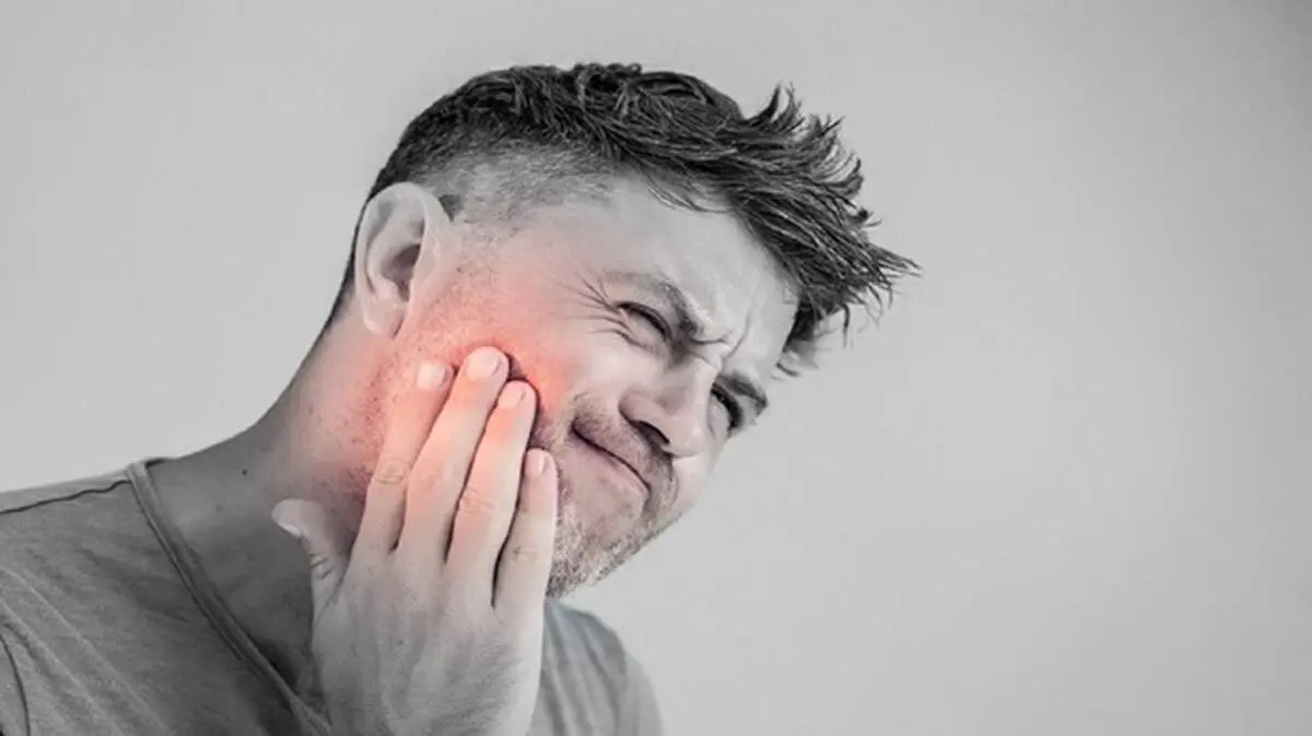 علائم عفونت لثه چیست + روش درمان