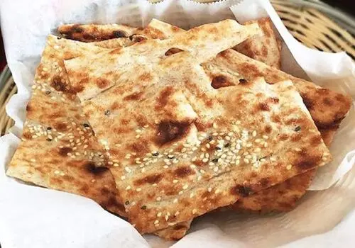 چرا پس از خروج ۱.۵ میلیون افغان، قیمت نان سنگک همچنان بالاست؟
