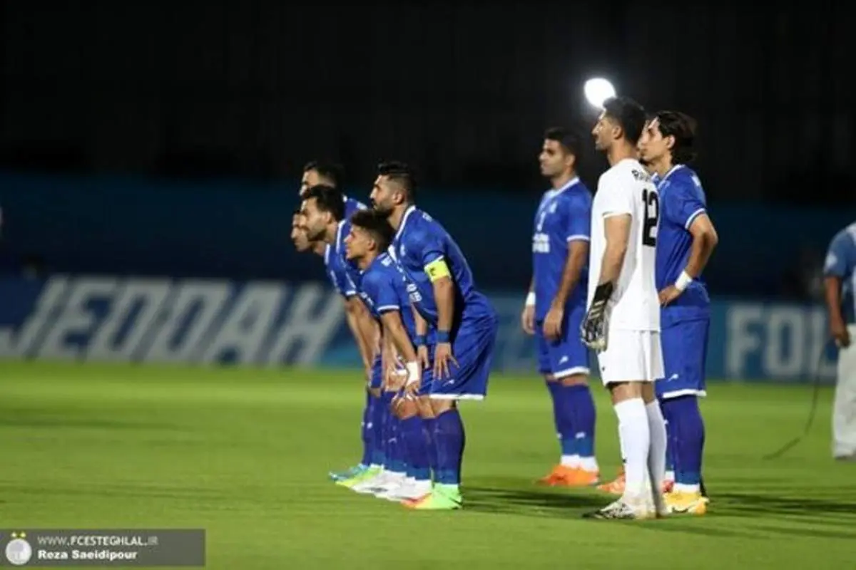 تصویری از کودک آزار دیده با پرچم استقلال+ عکس