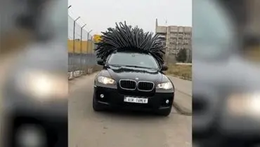 راننده‌ای که برای خودروی BMW خود موی بادکنکی کاشت! + فیلم