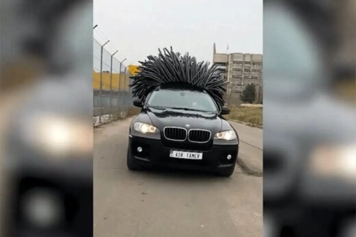 راننده‌ای که برای خودروی BMW خود موی بادکنکی کاشت! + فیلم