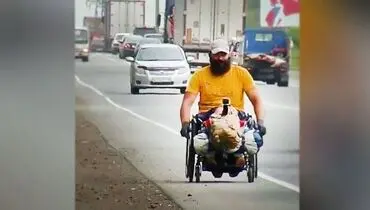 سفر یک مرد جوان با ویلچر! + فیلم